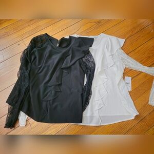 Guess black&White women's blouse with lace sleeves and a ruffled front. Size XL